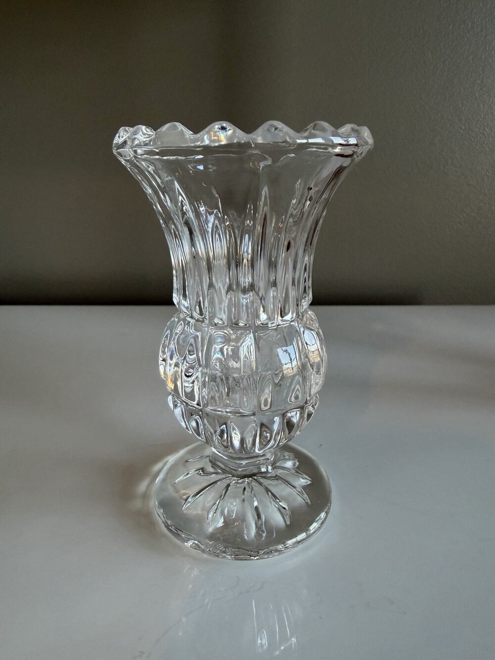 Pressed glass posy vase whirling hobstar base flared ribbed top sawtooth rim 4"